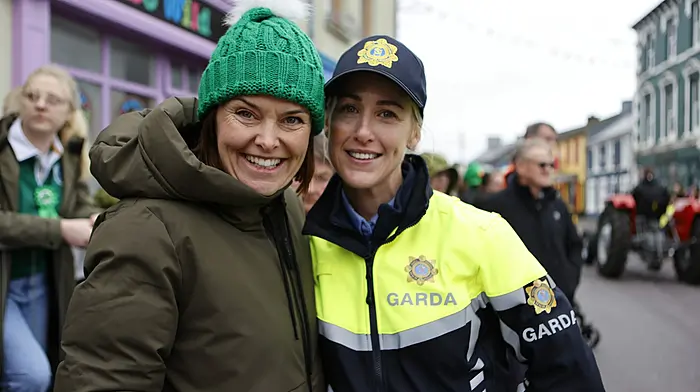 Laoise Hook and Garda Carina Finn, at the St. Patrick's Day parade in Schull. (Photo: Carlos Benlayo)