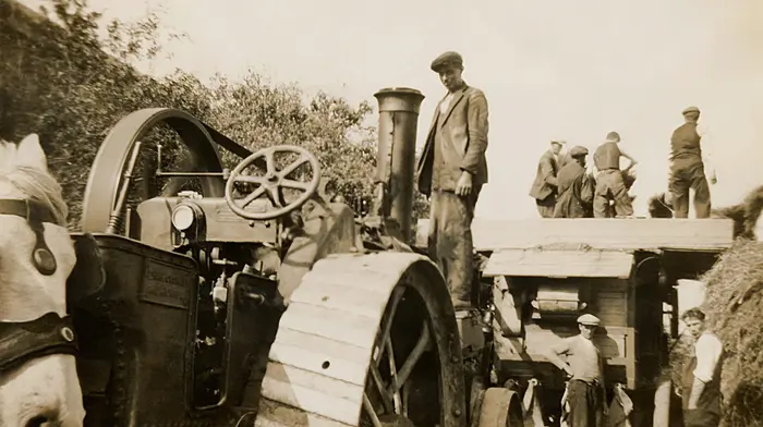 Threshing Day in Cronin's Munigave, Coppeen circa 1933.  John P. Crowley was the owner/operator of the steam engine and thresher.   (photo courrtesy of Colum Cronin)