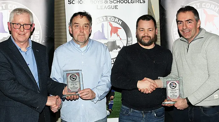 Declan Deasy and Tadhg Curtin present the 2025 Volunteer of the Year to joint winners, Michael Burgoyne (Riverside) and Sam Doherty (Clonakilty). (Photo: Paddy Feen)