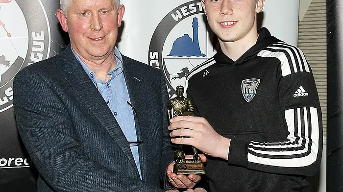 WCSSL Chairman Declan Deasy presents the 2025 U15 Boys Player of the Year award to Jack Allen of Castlelack. (Photo: Paddy Feen)