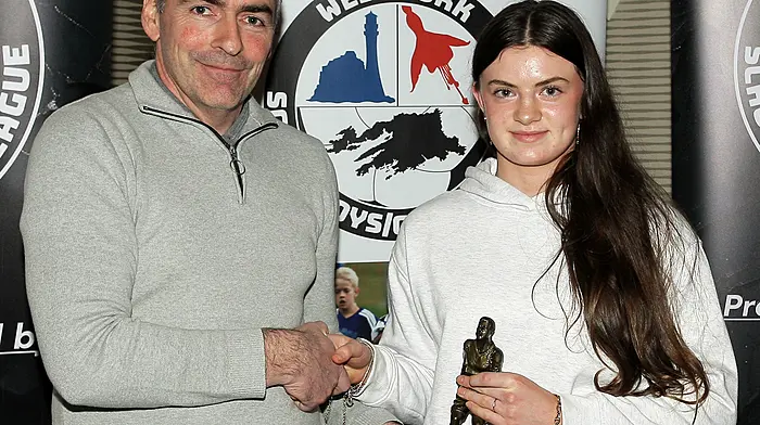 Tadhg Curtin presents the 2025 Girls U16 Player of the Year award to Sarah Buttimer (Drinagh Rangers). (Photo: Paddy Feen)