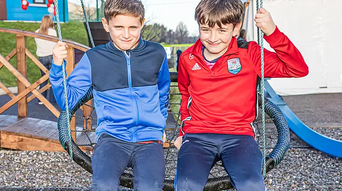 Paudie O Grady and John Downing enjoyong the playground in Trafrask Adrigole Picture: Anne Marie Cronin Photography