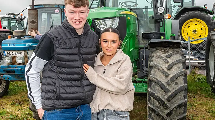 Adrian Collins (Ballineen) and Eabha Kehilly (Dunmanway) enjoying the charity tractor run which was held by the Ahiohill Vintage Club in aid of West Cork Rapid Response.   (Photo: Andy Gibson)