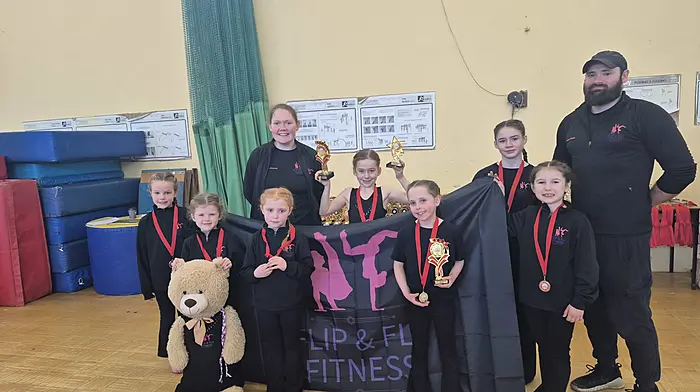 Flip & Fly Fitness club members participated in the 2026 West Cork Friendly Elements competition held in Clonakilty last weekend.  Back: Anaïs O'Donovan (coach), Abigail Sheehan, Maya Goulding and Isaac Finken (coach). Front: Millie Jepson, Sarah Kelleher, Freya O'Callaghan, Sophie Cronin, Isla Farrell and club mascot, Flipper.