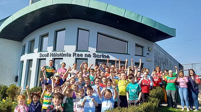 Pupils and staff at Reenascreena National School supporting the jersey day held for the Stand for Féile fund.