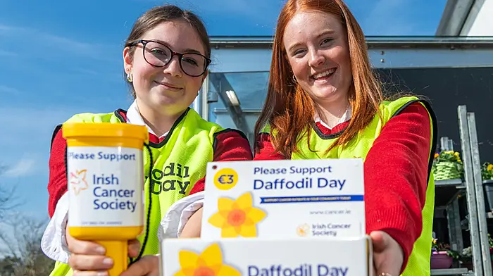 Clonakilty, West Cork, Ireland. 20th Mar, 2026. The Irish Cancer Society held its annual Daffodil Day today. Selling Daffodil Day products in Clonakilty were Emma Rea and Hettie Hough from Sacred Heart Secondary School in Clonakilty. Picture: Andy Gibson.
