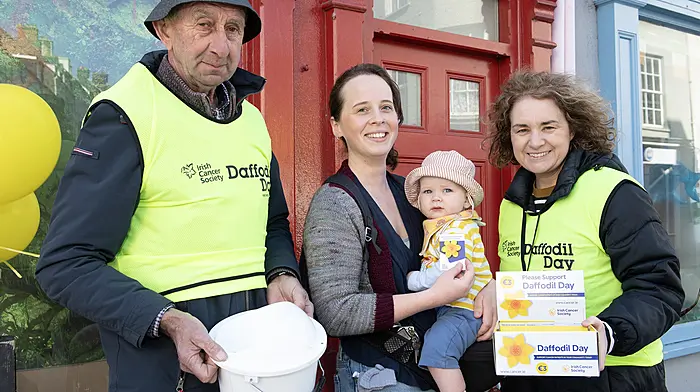 Caroline Hayes and her son Oisín Murphy supporting Daffofil Day with volunteers Mike Deasy and Elaine Forrristal on Pearse Stret, Clonakilty.   (Photo: Martin Walsh)