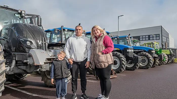 Sasha, Martin and Natalia Olesandr (Skibbereen) at the Ricky Barrett Memorial Tractor Run in Skibbereen Community School where Ricky was a former student, he was a young 17-year-old who had a passion for all things farming, especially his Fiat 70-90 and organised his own successful tractor run with the help of staff and students of the school in December 2021. Ricky would have celebrated his 21st birthday on the 3rd October, the day before the tractor run. Proceeds of the run will go to Féile O Sullivan Foundation in Beara.  
Picture: David Patterson, Tractor Run – Cork