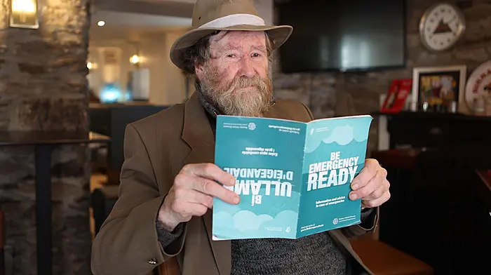 John J O'Sullivan of Long Island, Schull with the Be Emergency Ready campaign booklet as he familiarises himself with advice on preparing for emergency. (Photo: Carlos Benlayo)