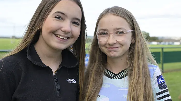 Darcy O'Donovan (left) and her sister Remi Bell at the Co-Op Superstores premier county junior hurling championship semi-final between Barryroe and St Catherine’s.  (Photo: Martin Walsh)