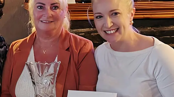 Patsy Murphy, the overall winner of the Dunmanway Floral Competition sponsored by Wilson Daly Solicitors, was presented with her prize by Donna Wilson