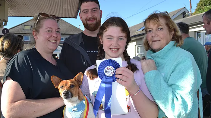 Snow the terrier took home a prize from the Dog Show at the annual Caheragh Threshing last weekend pictured with Aoibhe, Tom and Michaela Young, Drinagh and Therese O'Leary, Drimoleague. Photo; Anne Minihane.