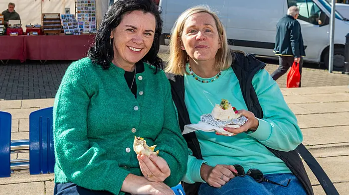 Bantry, West Cork, Ireland. 16th Oct, 2026. The sun shone in Bantry today, bringing locals out to the Friday Market in force. Enjoying some lunch at the market were Noreen Crowley and Nora Bishop from the Mealagh Valley. Picture: Andy Gibson.