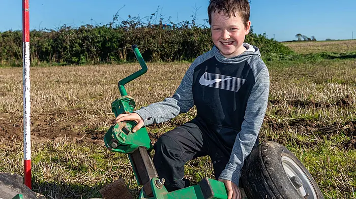 Clonakilty, West Cork, Ireland. 18th Oct, 2026. The first ploughing match of the Cork West season took place today, on the lands of Pat O'Neill and Eoin McCarthy in Richfordstown, Clonakilty. A large number of competitors took part in the first match of the Cork West Season. Getting to grips with part of a plough was Noah Hennessy from Clonakilty. Picture: Andy Gibson.