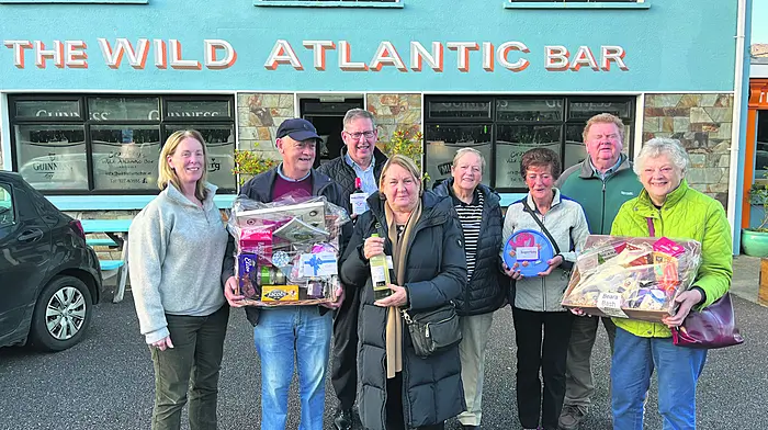 Kathryn Kingston, coordinator at the Caha Centre, with a Bere Island group who attended the Beara Big Bash last Friday.  From left: Kathryn Kingston, Benny Crowley, Vince Harrington, Eilis Harrington, Teresa Hall, Finola Crowley, Mark O'Sullivan and Monica Crowley.