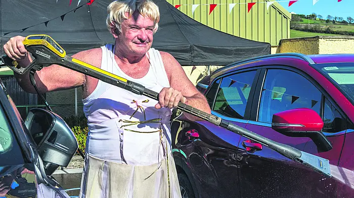 A Kilbrittain based charity group called 'The Community Offenders' hosted a charity car wash at Kilbrittain Community Centre last Sunday. Taking part in the car wash was Vincent Hickey from Kilbrittain.   (Photo: Andy Gibson)