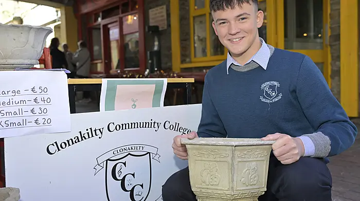 Enterprising Clonakilty Community College student George Cronin from Macroom with some of his West Cork Plant Pots products on Pearse Street, Clonakilty.   (Photo: Martin Walsh)