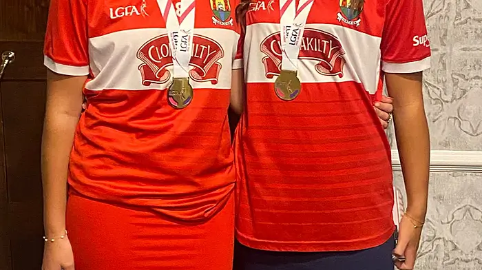 Cork footballers Ruby Humston and Nicole O'Sullivan of O'Donovan Rossa who recently received their U14A platinum All-Ireland and Munster championship medals at a presentation ceremony held in the Rochestown Park Hotel last Saturday.