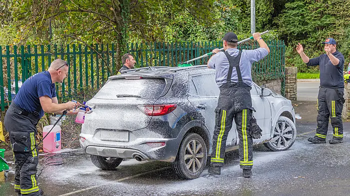 Kinsale Fire and Rescue station officer David O’Donovan directs operations during their charity car wash event in aid of Kinsale Youth Support Services, Kinsale Youth Centre and Epilepsy Ireland.    (Photo: Gearóid Holland)