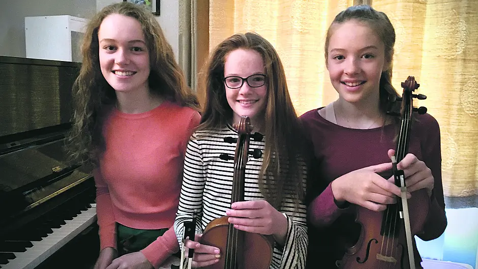 Talented sisters keep spirits up Image