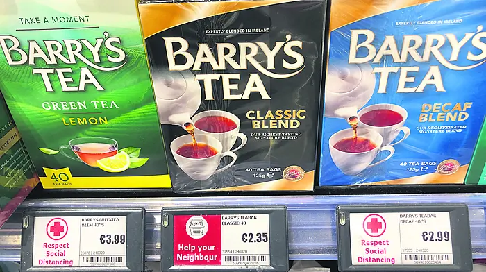 Social distancing mesage on price tags Image