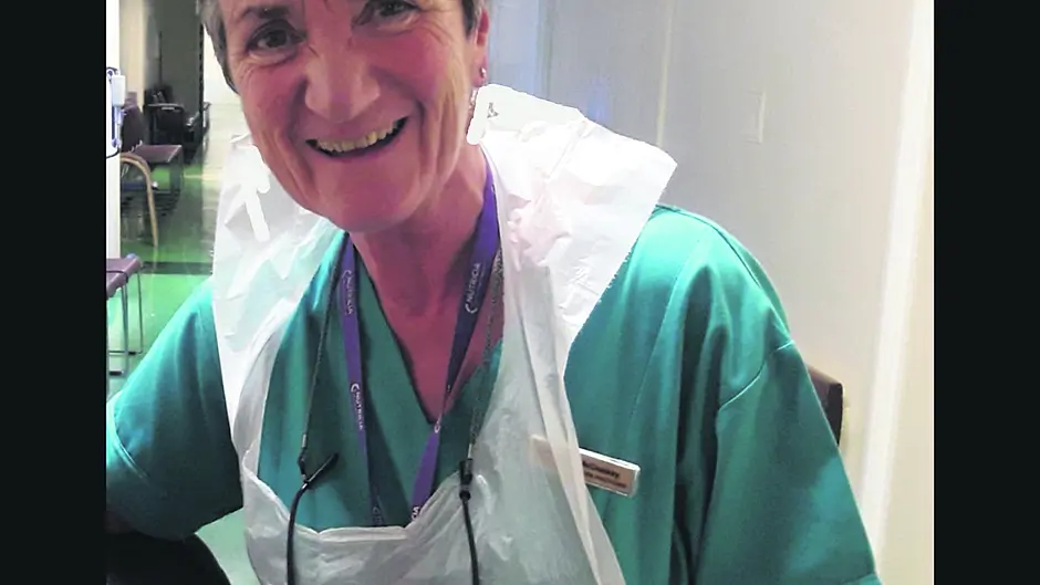 Pat receives her award on behalf of CUH team Image