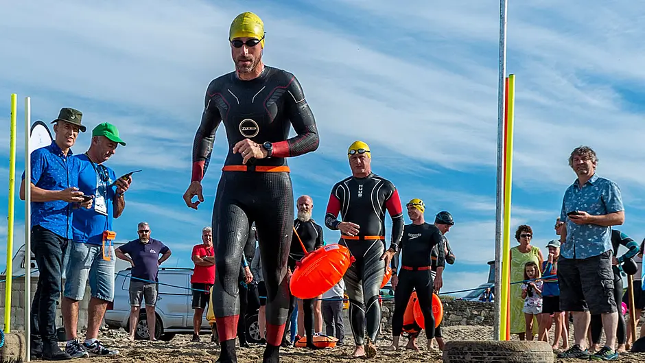 Swimmers heading off at socially-distanced intervals  (Photos: Andy Gibson)