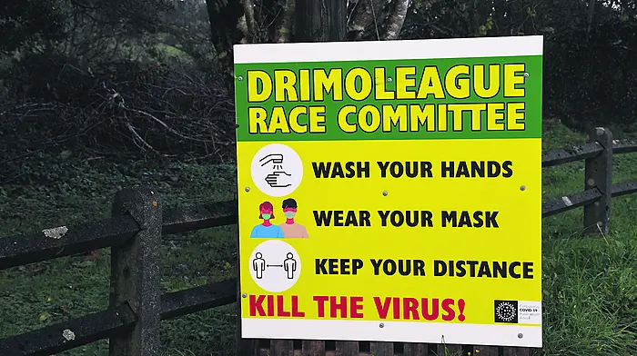 Race committee erects Covid information signs in village Image