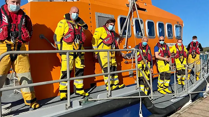 Six people rescued at Rocky Bay after being cut off by the tide Image