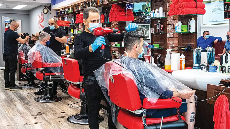 The Golden Scissors barber shop in Bandon was busy from early morning on Monday ((Photos: Andy Gibson, Anne Minihane, Martin Walsh & David Creedon)