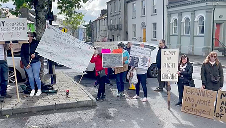 WATCH: Group protesting against masks gather outside court in Bandon Image
