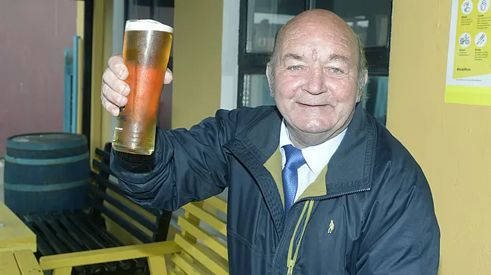 Enjoying a pint at The Stables bar at Bandon was Paddy Buckley from Crossbarry.  Left: Ray and Ken O'Callaghan. raise a glass in The Stables. (Photos: Denis Boyle)