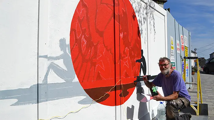 A BRUSH WITH GENIUS Artist honours Olympians Image
