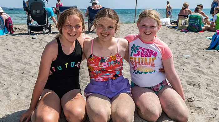 Rosscarbery, West Cork, Ireland. 22nd Jul, 2021. West Cork basked in another sweltering hot day today, with temperatures in the high 20's. The Warren Beach, Rosscarbery was packed with holiday makers. Enjoying the beach were Ava Crowley, Ahiohill and Meadhbh and Caitlin McCarthy from Rathbarry. Picture: Andy Gibson.