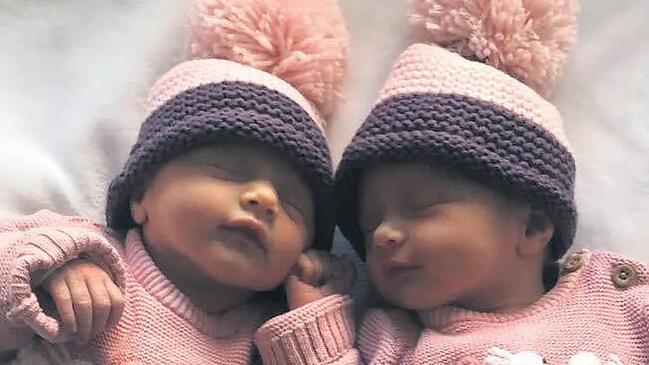 Twin sisters are tickled pink to make history Image