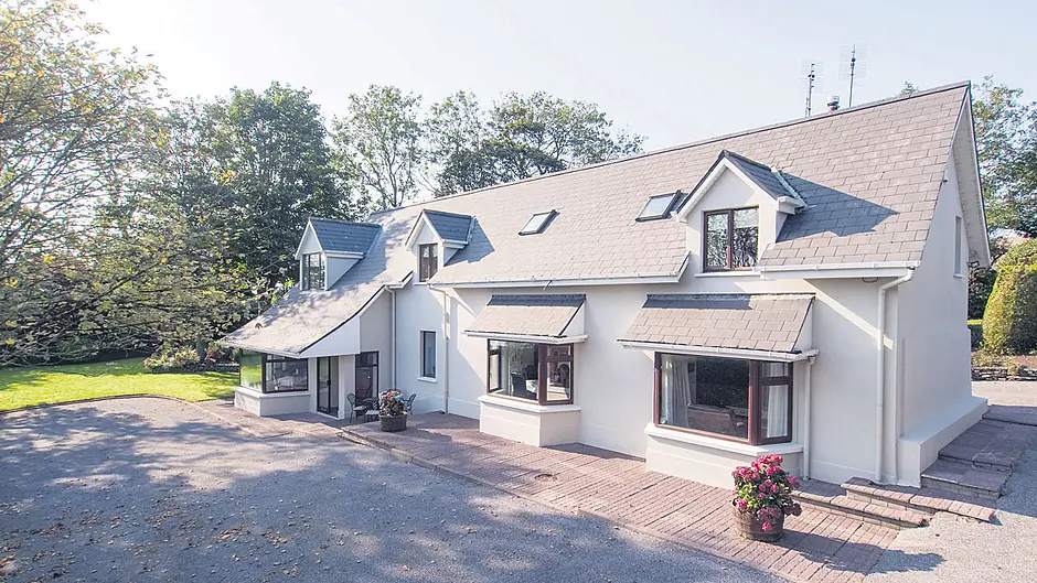 The interior of the attractive bungalow may need some updating but it’s in perfect condition and comes with the added bonus of an adjacent stone barn which is most charming and which could be used for various activities.