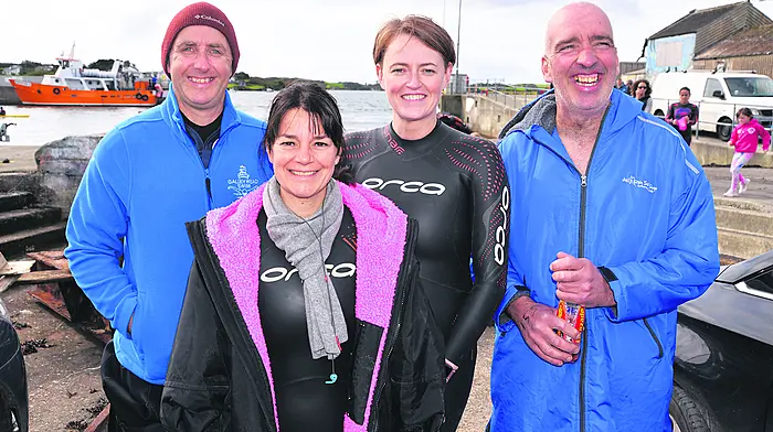 Damien Deasy, Severine Lacroix and Ríona Casey, Union Hall, with Severin McCullagh, Dunmanway, taking part in the Baltimore 2.2 km Lousy Rocks Swim.			                        (Photo Siobhán Russell)