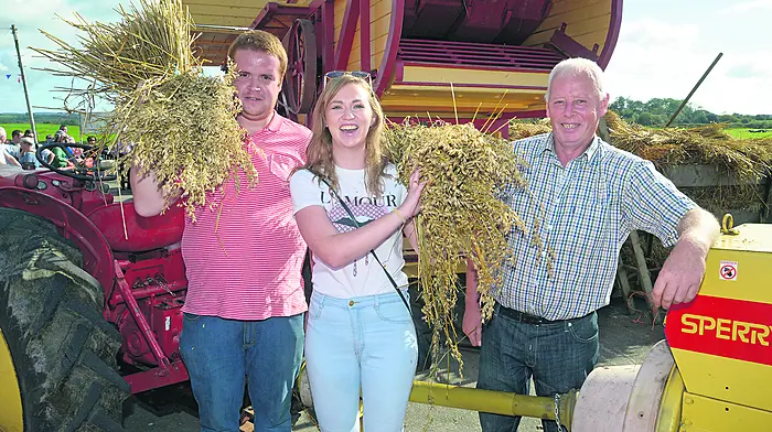At the Caheragh threshing were Rosemary Daly from Dunmanway with Humphry O'Sullivan and John Collins. Picture Denis Boyle