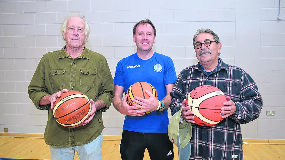Supermodel Emily Ratajkowski’s dad John (left), presented Bantry Basketball Club coach Pa Curran with a new set of jerseys. He was accompanied by Robert Romero, far right, owner of Tivoli Bar in San Diego, who co-sponsored the jerseys with Emily and her husband