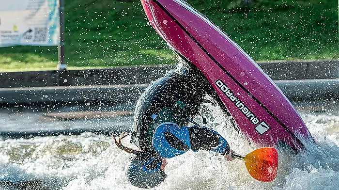 Paddling her own kayak Image