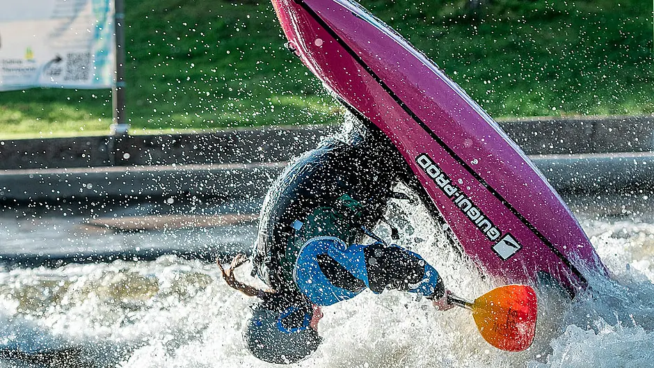 Paddling her own kayak Image