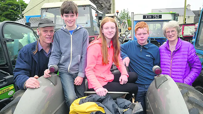 Enjoying a tractor and vintage run in Dunmanway  in aid of MS Ireland, St Mary’s Church and Co-Action West Cork were Robert, Trevor, Karen, Robbie and Annetta Ducklow from Durrus.
 (Photo: Denis Boyle)