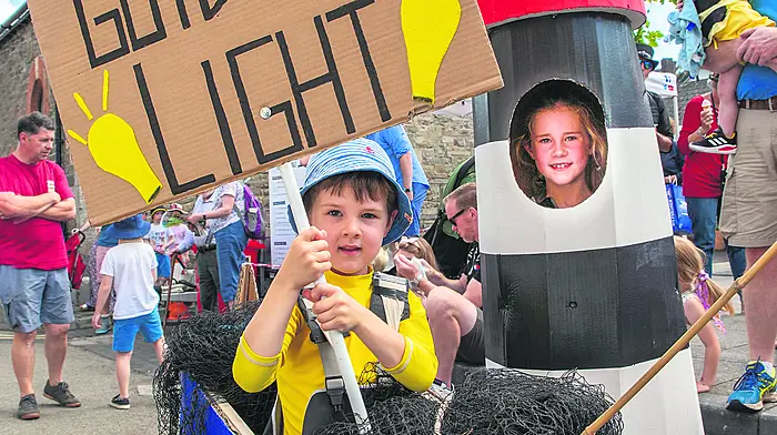 Tommy and Faye Harding from Bishopstown dressed as a fishing boat and as a lighthouse at the children’s fancy dress parade on Sunday during the Kinsale Regatta Festival. 					                       (Photo: John Allen)