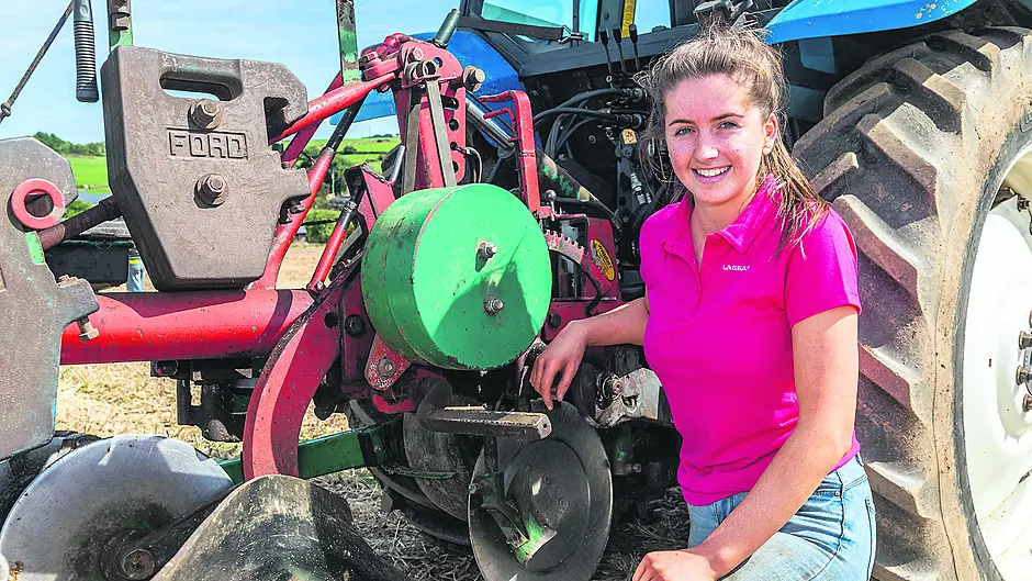 Ellen Nyhan from Ballinspittle, a qualifier for the All-Ireland Ploughing Competition, taking part in the ladies class at the De Courcey Classic & Vintage Club Harvest Working Day, which was held in Ballinspittle at the weekend. 								         (Photo: Andy Gibson)