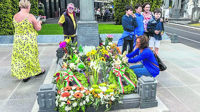 Hundreds of people paid their respects at General Collins’ grave in Glasnevin on Monday. 	        (Photo: Andy Gibson)