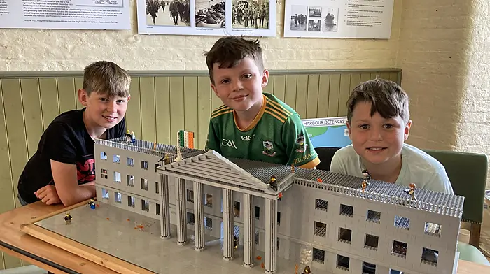 Conor, Patrick and JJ Foy from Douglas in Cork, with a model of the GPO in 1916 which they built with Lego bricks and displayed at the recent Garrison Model Show in Crosshaven’s Camden Fort Meagher. The original model had been created by their cousin Jerome McCarthy from Glandore, and after it was taken apart, the Foy brothers rebuilt it. Jerome and his two brothers appeared with the model on The Late Late Toy Show a few years ago.