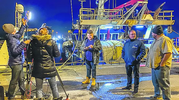 Donie O’Sullivan interviews Patrick Murphy on ther pier in Castletownbere. 		                  (Photo: Anne Marie Cronin)