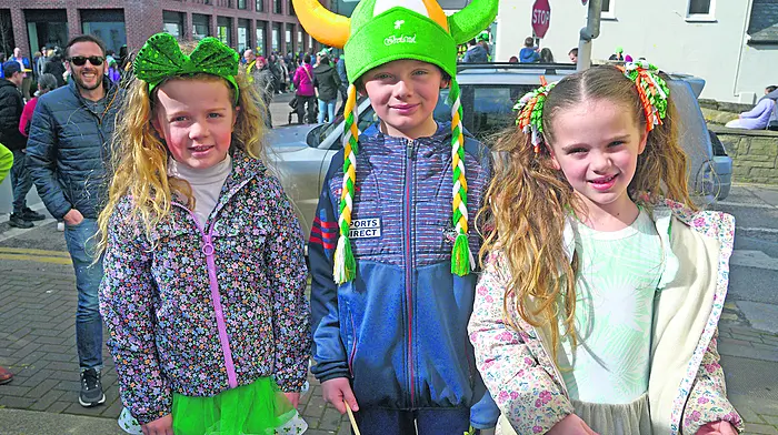 At Bandon’s parade were Mary Kate Cassidy with Arann and Alice O'Boyle. Right, in Dunmanway were: Emily Bayer, Sophie Mawe Downey, Ellie O Donoghue, Charley Mawe McCarthy, Melissa Duggan, Lauren Mawe Downey, Aoibhinn Gleeson, Irene Mawe, Sharon Mawe. (Photo: Denis Boyle)