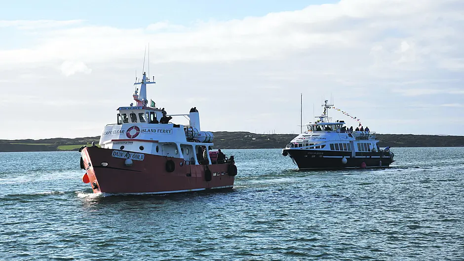 The Cape Clear ferry Dun An Oir escorting the Spirit of Doolin, which arrived from the Aran Islands on Saturday afternoon into Baltimore. 							                   (Photo: Anne Minihane)