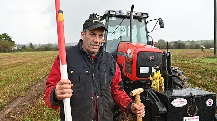 Michael Wycherley, taking part in the senior reversible event at Clonakilty Ploughing. Right: also at the event were James and Conor Twomey from Minane Bridge. (Photos: Denis Boyle & David Patterson)